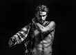 © Volodymyr - Sexy young handsome naked man with messy hair, wears plaid shirt on dark background. Seductive gay.