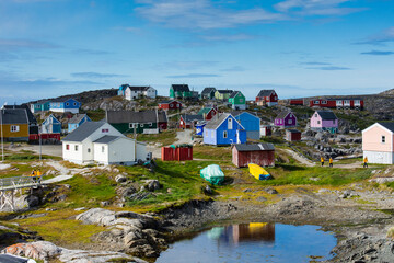 Poster - Greenland. Itilleq. Tourists walking though town.