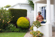 © Wavebreak Media - Thoughtful african american senior woman holding coffee cup while sitting on porch of the house
