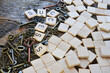 © Pam Walker - A close up image of tiles spelling out 'success' on an old wooden table.