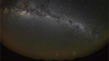 Wall Mural - Time Lapse of the stars moving across the night sky. Shot in Namibia.