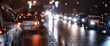 abstract blurred view of the night city from a car window, traffic in the city