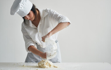 Wall Mural - Woman chef preparing dough household healthy food