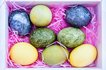  Easter colored eggs in white box with pink ribbons