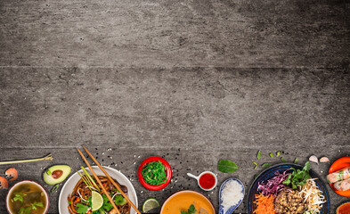 Wall Mural - Various of asian meals on rustic background , top view , place for text. Asian food concept.