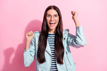 Sticker - Photo of triumphant young happy woman raise fists wear glasses isolated on pastel pink color background