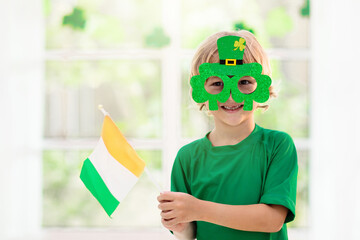 Kids celebrate St Patrick Day. Irish holiday.