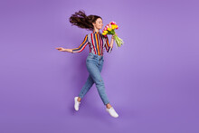Full Length Body Size Photo Of Woman Jumping High Smelling Tulip Flowers Scent Isolated Bright Violet Color Background