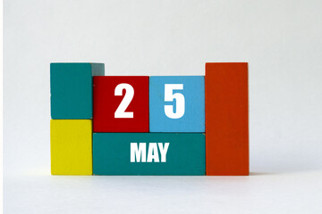 day of month. cube calendar on multi-colored cubes on white background