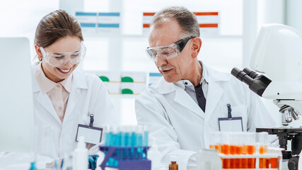 Wall Mural - close up. scientists work in the laboratory for blood research.