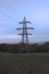 National grid, electricity pylon in a UK farmers field 