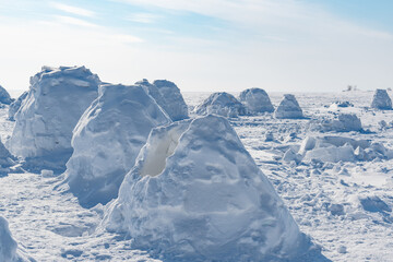 Wall Mural - Winter dwelling of Eskimos. Igloo. Eskimos village.