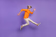 Leinwandbild Motiv Full body profile side photo of aged man have fun jump happy positive smile isolated over purple color background