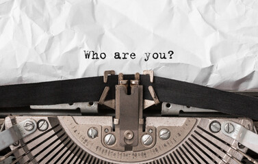 Poster - text who are you typed on retro typewriter