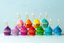 Colorful Cupcakes Spelling Happy Birthday