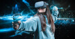 © andy_gin - Image of a beautiful stylish woman wearing VR glasses and holding joysticks. Virtual reality concept.