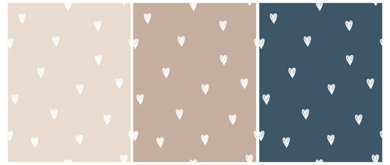 Wall Mural - cute hand drawn irregular romantic seamless vector pattern. white hearts isolated on a light cream, 