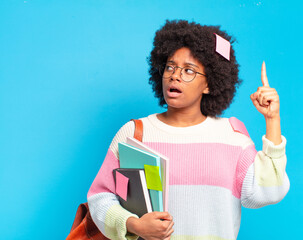 Wall Mural - young pretty afro student woman