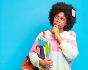 Wall Mural - young pretty afro student woman