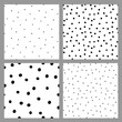 © Elena - Vector set of seamless textures with random dots. Polka dot seamless patterns with black dots on white background. Card templates.