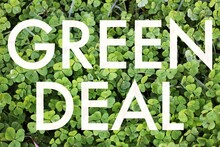 text green deal in a nature background.