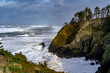 A headland dropping into the Pacific Oceannear the mouth of the Columbia River, Ilwaco, Washington.