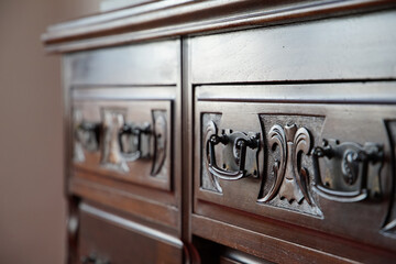 Sticker - Wooden furniture with drawers with handles in the room