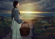 Victorian Girl With A Wicker Basket In White Dress And Blue Striped Blouse At Seaside At Sunset.
