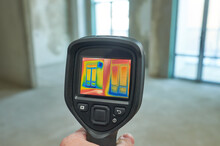 Thermal Imaging Camera Inspection Of Window Building. Check Heat Loss