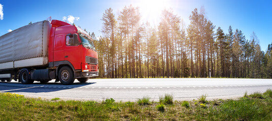 Truck moving on the highway in summer