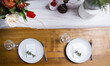 Photo of wooden table with decorated plate for wedding ceremony