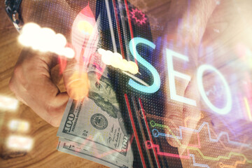 Aufkleber - Multi exposure of seo drawing hologram and us dollars bills and man hands.