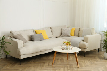 Sticker - Stylish beige sofa in living room interior