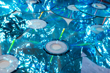 Closeup Of Shiny Blue Compact Discs As A Abstract Background
