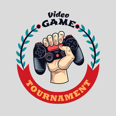 Fototapete - Colorful badge with grasping gamepad vector illustration. Vintage label with joystick in human hand. Cybersport and gaming tournament concept can be used for retro template