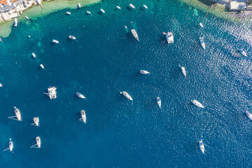 Wall Mural - Aerial overhead drone shot of yachts on Adriatic sea near Vis Island in Croatia summer
