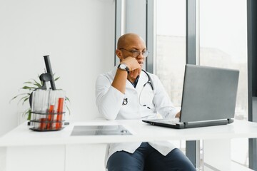 Wall Mural - african american doctor in modern office