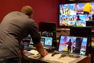 button on the control panel television equipment.