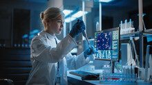 Medical Research Laboratory: Portrait Of Female Scientist Working With Samples, Using Micro Pipette Analysing Sample. Advanced Scientific Lab For Medicine, Biotechnology, Vaccine Development