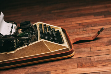 Fototapete - typewriter with keys on a wooden background retro style close-up macro
