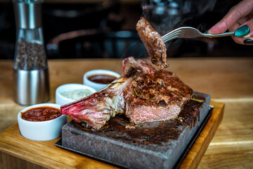 juicy steak on the grill stone