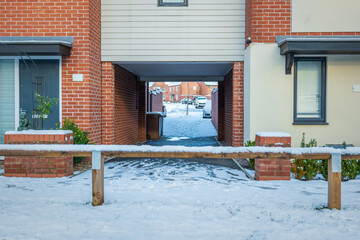 Wall Mural - New built terraced houses under snow in england uk