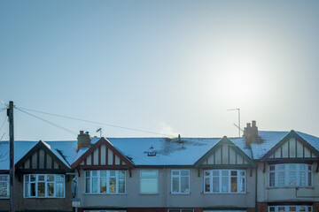 Wall Mural - Terraced houses under snow in england uk