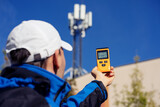 Fototapeta Storczyk - Electromagnetic radiation measuring under mobile network tower