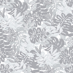  Seamless camouflage pattern with tropical leaves
