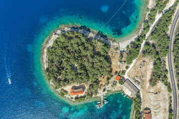 Wall Mural - Aerial overhead drone shot of penisula on Vis Island in Adriatic Sea in Croatia summer