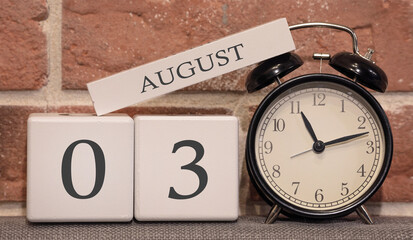 Wall Mural - Important date, August 3, summer season. Calendar made of wood on a background of a brick wall. Retro alarm clock as a time management concept.