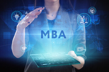 Business, Technology, Internet and network concept. Young businessman working on a virtual screen of the future and sees the inscription: MBA