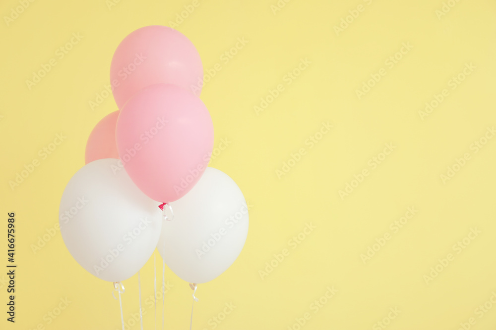 Air balloons on color background