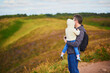 © Ekaterina Pokrovsky - Man and toddler girl walking in heather meadows on Cape d'Erquy in Brittany, France